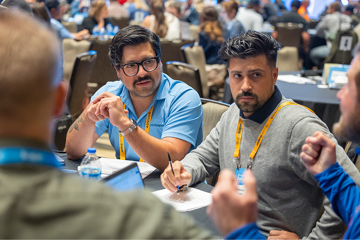 Advisors collaborating at a table